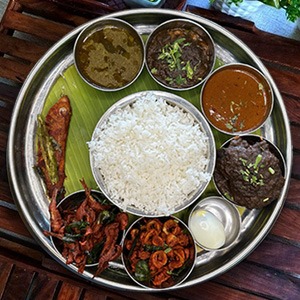 (White Rice, Fish Curry, Crab Masala, Prawn Masala, Fish Fry, Kanava Fry, Nethili Fry, Egg, Rasam, Koottu & Payasam)
