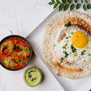 Egg Dosa with Fish Curry