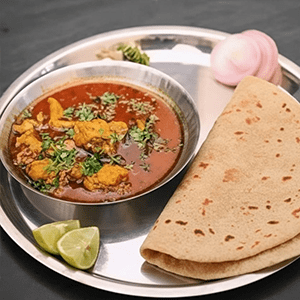 Chapathi with Nattu Kozhi Kozhambu